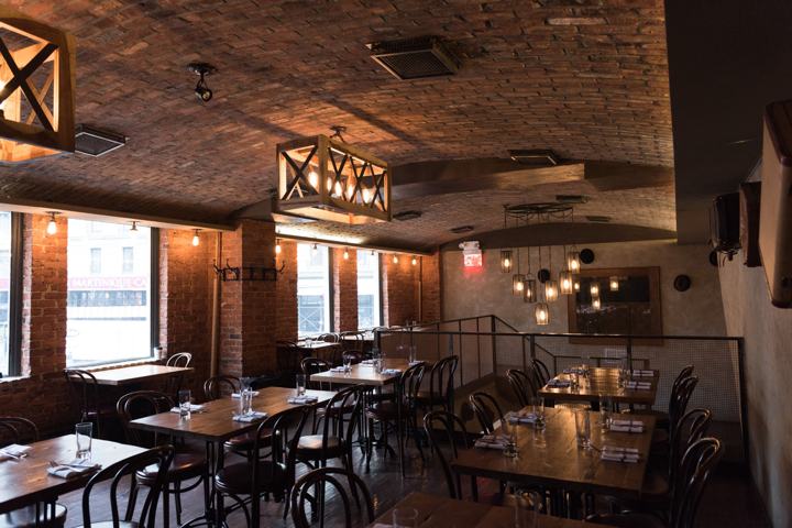 The Harold dining room with exposed brick walls