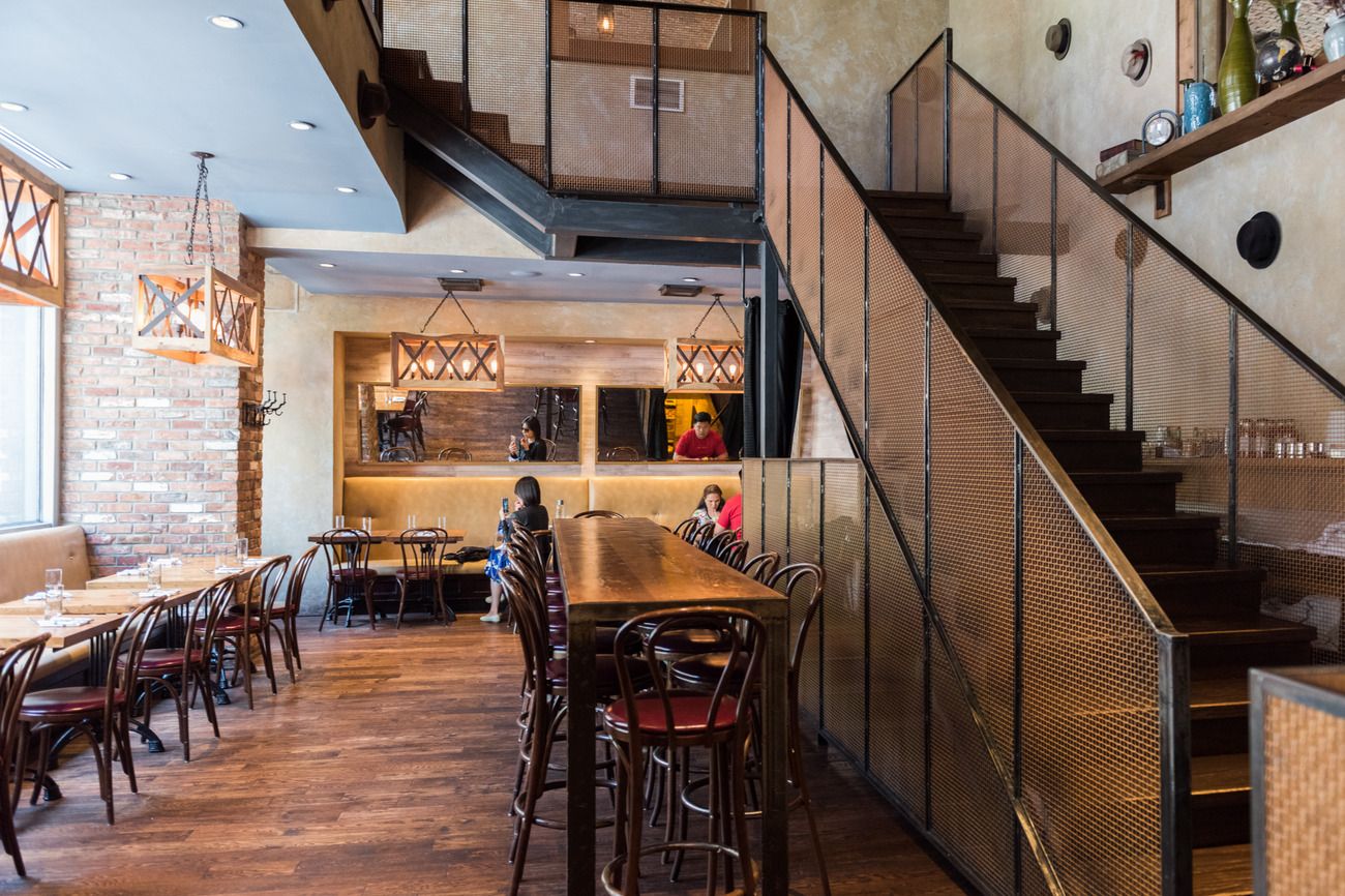 The main floor and staircase up to the mezzanine